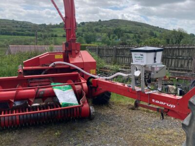 New Holland Chopper in pasture